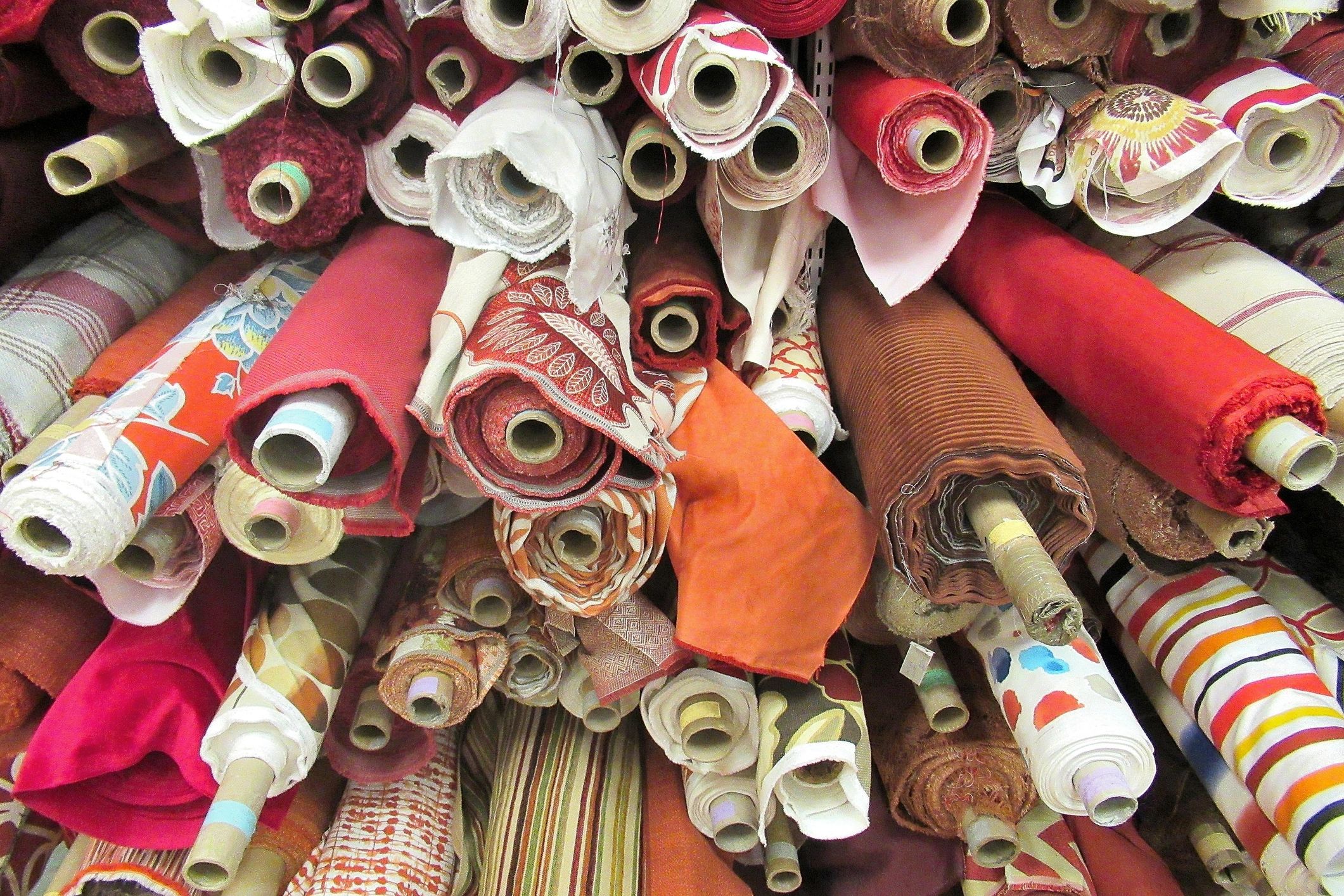 Colorful textile fabrics arranged in a boutique setting