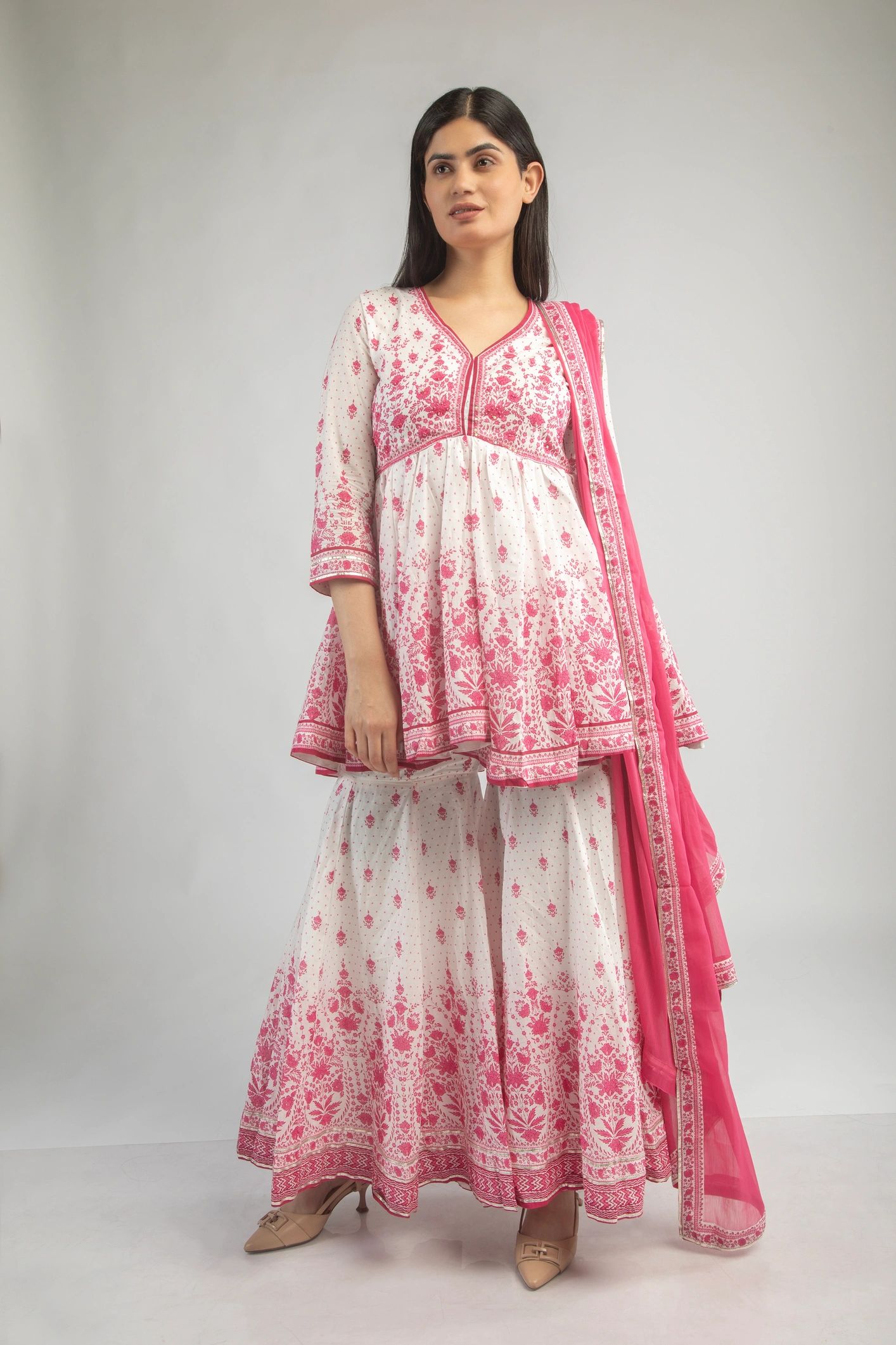 Portrait of a smiling customer in traditional clothing